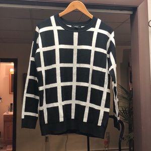Black/white checker pattern sweater